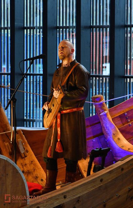Einar Selvik singing and playing in the Myklebust ship.